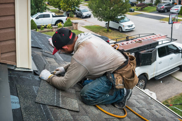 Professional Gutter Repair And Installation technician working in Farmington, MI